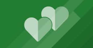 Article image for 25 Remote Employee Reward Ideas -- two hearts on green background