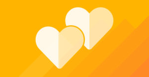 Image for Why Workplace Diversity Builds Effective Teams -- two hearts on a yellow background